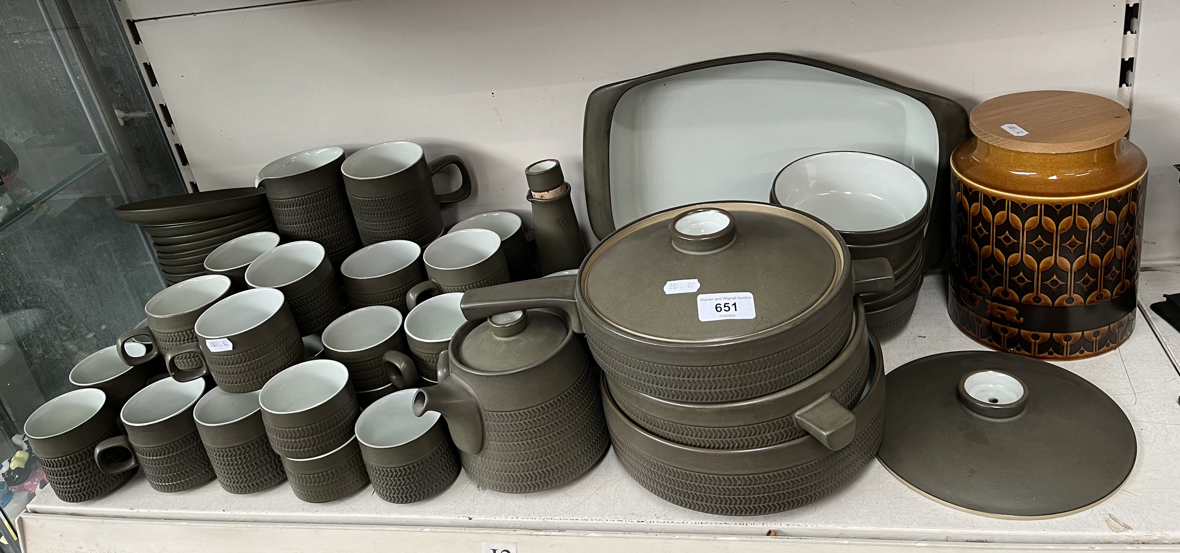 A Denby stoneware dinner service (over 60 pcs) and a Hornsea jar.