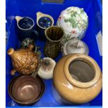 Kitchen wares including a set of copper strainers, an Annie Rowe large storage jar, Denby jugs, face