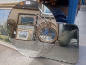 A vintage etched glass mirror depicting a heron together with another vintage mirror.