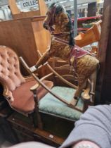 A vintage rocking horse and a nursing chair.