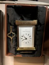 A boxed Mathew Norman brass carriage clock.
