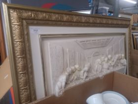 A moulded relief picture depicting the last supper.