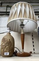 A studio pottery table lamp and a retro teak table lamp