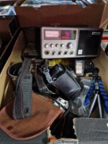 A box of misc including a Murphy CB base station with microphone, a Olympus 35mm camera and a