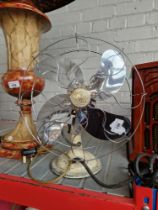 A vintage "Limit" electric fan.
