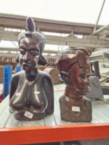 Two hardwood carved busts.
