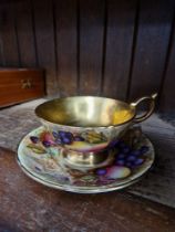 A hand painted Aynsley cup and saucer.