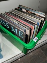 A box of assorted records, various genre.