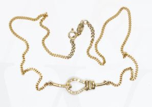 A diamond necklace, the cluster formed as a bow and hook, chain with 9ct gold import marks, length