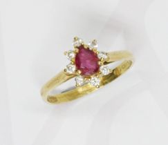 An 18ct gold diamond and ruby cluster ring, the cluster measuring approximately 10.60mm x 8.75mm,