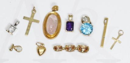 A group of ten assorted pendants, various settings, various 9ct marks and some unmarked, gross