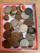 A tray of assorted coins to include a George III 1799 half penny & Victoria 1892 half crown etc.