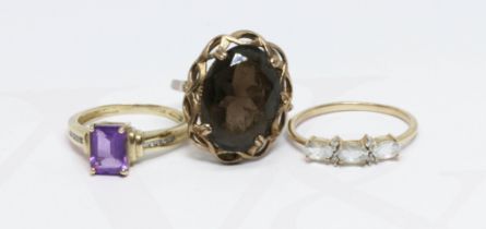 A group of three hallmarked 9ct gold rings, various settings, gross weight 9g, size O, Q & S (