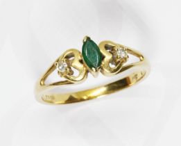 An emerald and diamond ring, 18ct gold import marks, gross weight 3.3g, size P. Condition - good,