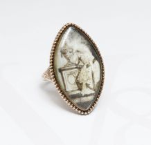 A Georgian mourning ring, the navette shaped ivory panel painted en grisaille depicting a lady