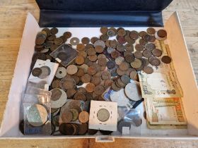 A box of assorted GB, world coins and banknotes.