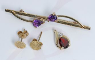 A mixed lot comprising a hallmarked 9ct gold brooch, a pair of hallmarked 9ct gold ear studs and a