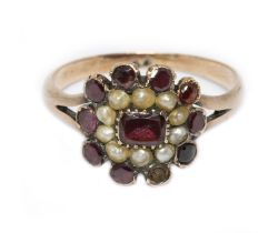 A 19th century garnet and split pearl cluster ring, unmarked, gross weight 2.5g, size P. Condition -