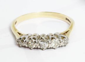 A five stone diamond ring, total approximate diamond weight 0.46 carats, hallmarked 18ct gold