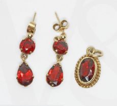 Hallmarked 9ct gold garnet earrings and similar pendant, gross weight 4.1g.