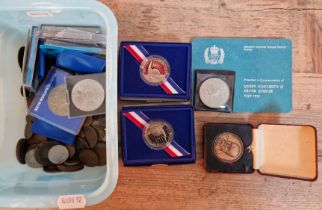 A box of assorted world coins to include 2 x proof half dollars, commemorative crowns & Victoria...