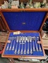 A cased set of silver plated fish eaters, Walker & Hall.
