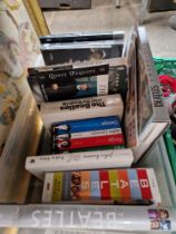 A box of assorted Beatles books, DVDs and a calendar