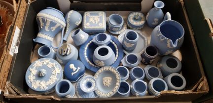 A box of blue and white Wedgwood Jasperware.
