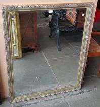 A modern gilt framed mirror.