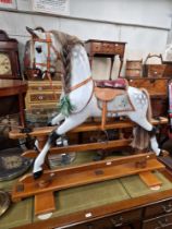 A large late 20th century dapple grey rocking horse By Stevenson Brothers, England with leather