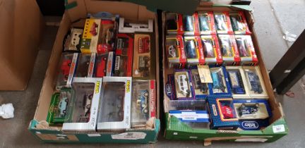 32 boxed model vehicles including Burago, Dinky, Matchbox etc.