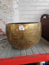 A large brass bowl