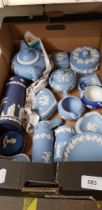 A box of blue and white Wedgwood Jasperware including teapot, etc.