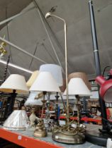 A group of appx 11 assorted table lamps and reading lamps.