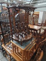 Various items of furniture; metal wine rack, mahogany Canterbury/whatnot, tile top nest of tables,