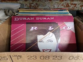 A box of rock and pop LPs to include Duran Duran, Michael Jackson, etc.