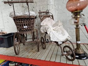 Two children's dolls prams.