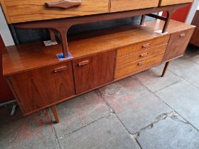 A mid 20th century teak sideboard by Avalon, length 203cm (approx).