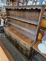 An aged oak Welsh dresser, width 198cm.