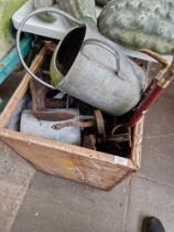 A tea chest of assorted items to include galvanised watering can, shoe last, coal bucket & walking