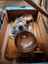 An early 20th century oak and brass tray with various items of metalware, brass candlesticks, copper