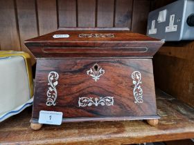 A 19th century rosewood and mother of pearl tea caddy.