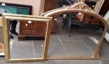 Two gilt framed mirrors; an overmantle and one other.