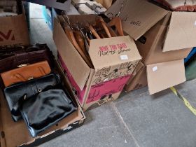 1 box of ladies handbags, 1 box of coat hangers and 2 boxes of cushions.