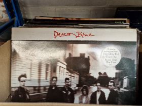 A box of rock and pop LPs to include The Police, Deacon Blue, etc