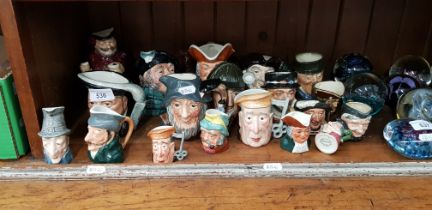 A collection of small and miniature toby jugs, mostly Royal Doulton.