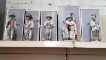 Five piece Lladro band figures with boxes
