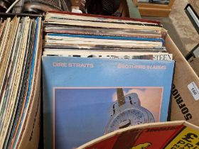 A box of LPs including Dire Straits, Bruce Springsteen, etc.