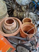 7 assorted terracotta planters