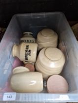 A box of Moira earthenware pots and barrels.
